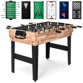 A foosball table with multiple games and accessories arranged around it, inviting players to join in.